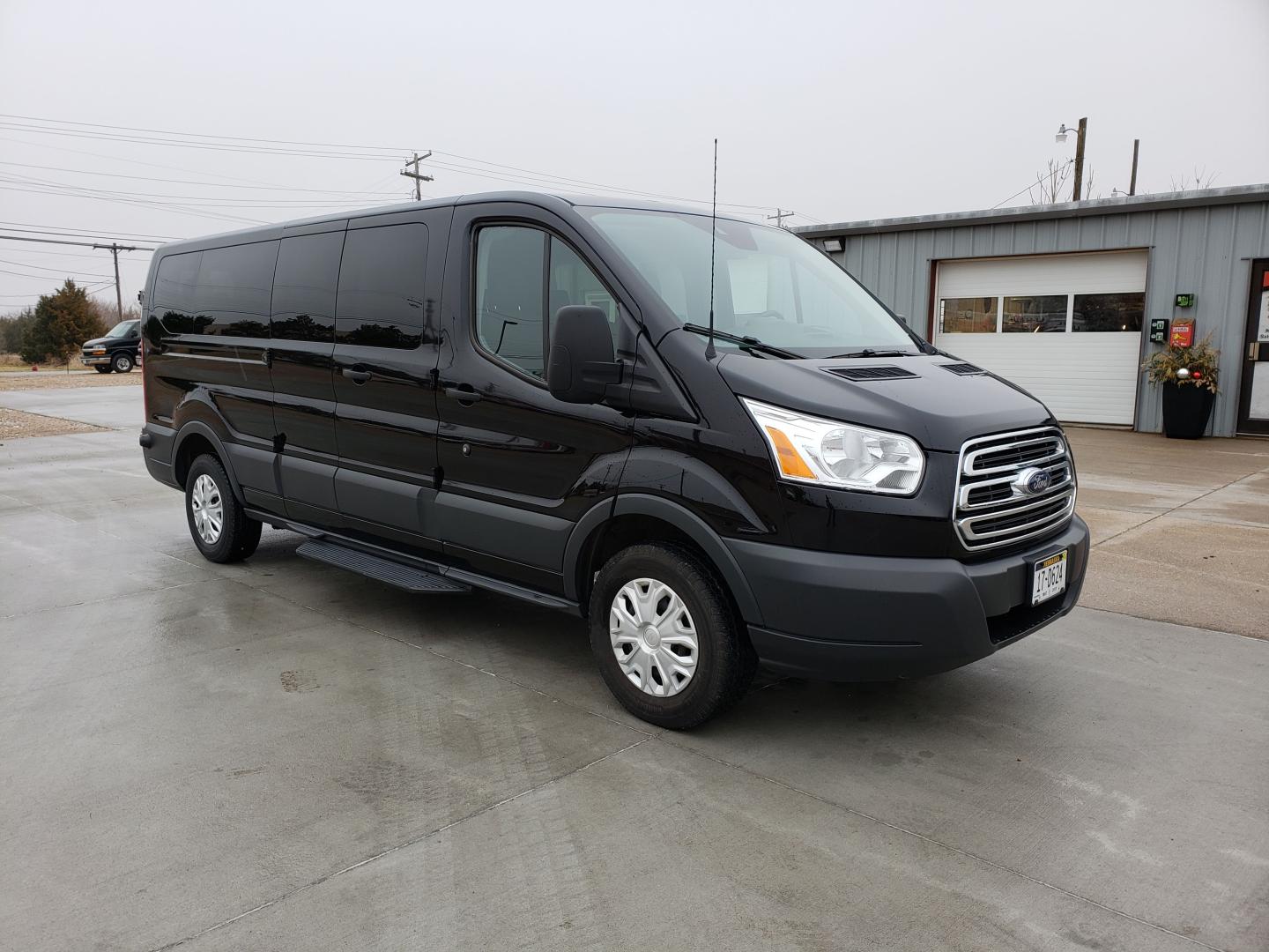 2018 Black Ford Transit 350 Wagon Low Roof XLT 60/40 Pass. 148-in. WB (1FBZX2ZM8JK) with an 3.7L V6 DOHC 24V engine, 6A transmission, located at 205 W Nobes Rd, York, NE, 68467, 40.857784, -97.594452 - Photo#0