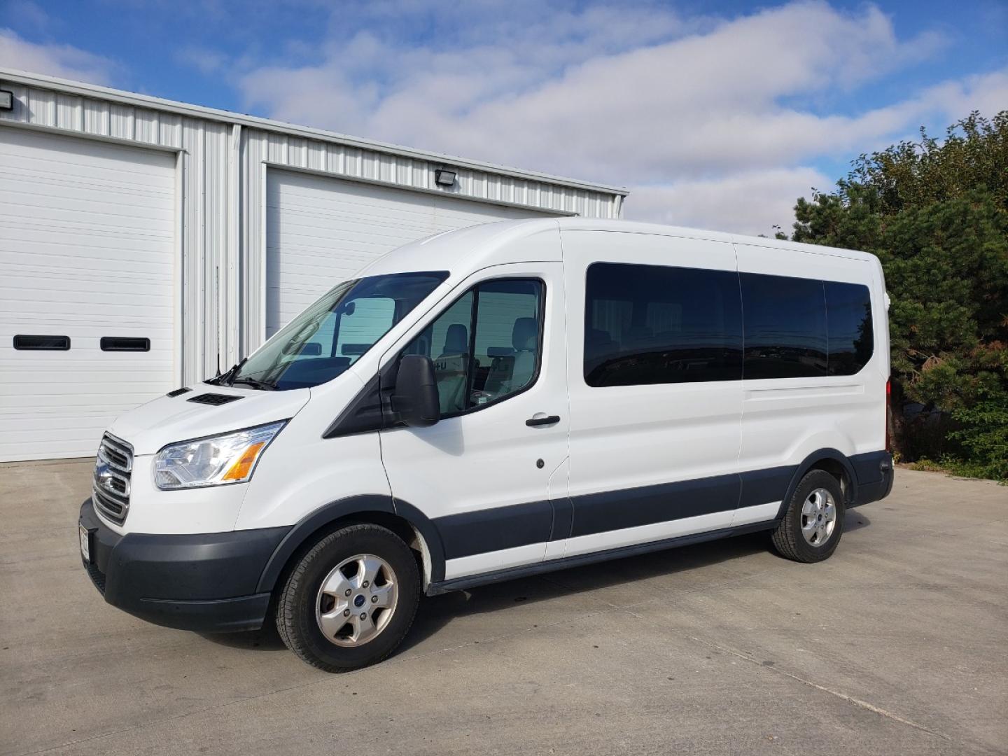 2018 White /Gray Ford Transit 350 Wagon Med. Roof XL w/Sliding Pass. 148-in. WB (1FBAX2CG8JK) with an 3.5L V6 DOHC 24V engine, 6A transmission, located at 205 W Nobes Rd, York, NE, 68467, 40.857784, -97.594452 - Photo#1