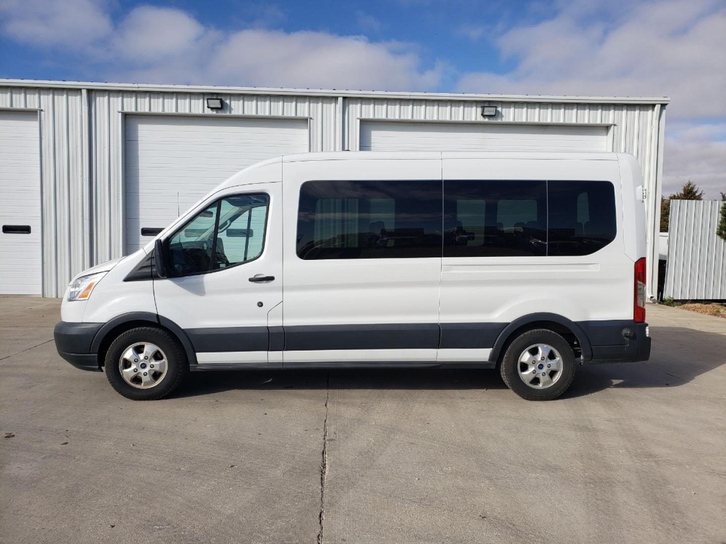 2018 White /Gray Ford Transit 350 Wagon Med. Roof XL w/Sliding Pass. 148-in. WB (1FBAX2CG8JK) with an 3.5L V6 DOHC 24V engine, 6A transmission, located at 205 W Nobes Rd, York, NE, 68467, 40.857784, -97.594452 - Photo#2